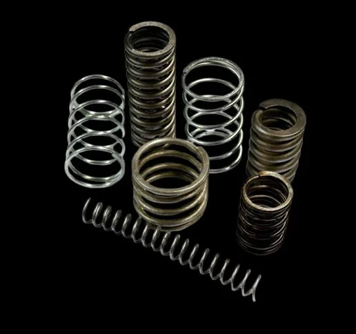 Multiple industrial compression springs of different diameters and lengths